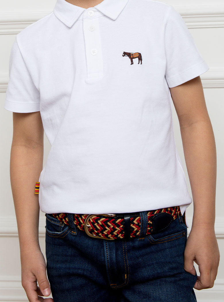 Child wearing a hand woven belt, braided and handmade in Italy with the Newmarket signature colours (gold, tan, navy) and a stretch design.