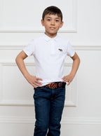 Child wearing a hand woven belt, braided and handmade in Italy with the Newmarket signature colours (gold, tan, navy) and a stretch design.