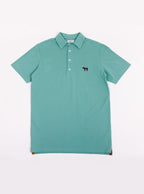 Flat lat of men's avocado green polo shirt in 100% cotton with Newmarket 875 horse logo embroidered on the front.