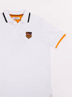 Flat lay of men's white polo shirt in 100% cotton with Newmarket 875 crest embroidered on the front and giant red 8 on the back with navy sleeve trimming and gold collar trimming.