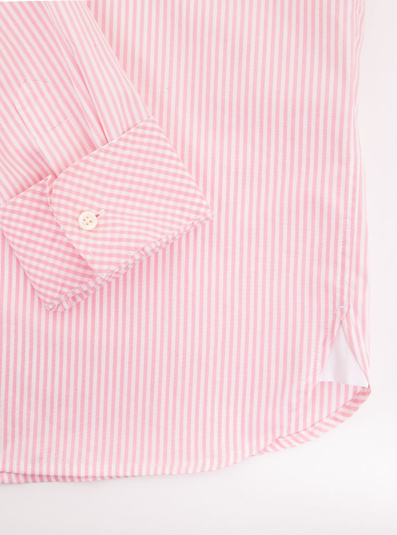 Flat lay of men's long sleeved shirt with pale pink thin stripe and gingham cuff and collar pattern on the inside. Made with 100% cotton in Thomas Mason fabric.